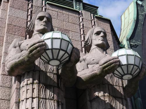 Statues at the entrance to the main train station, Helsinki